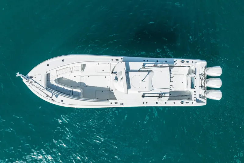 Slide: The Image of Aerial view of a 2020 Yellowfin 36 Offshore boat on blue water. - 13