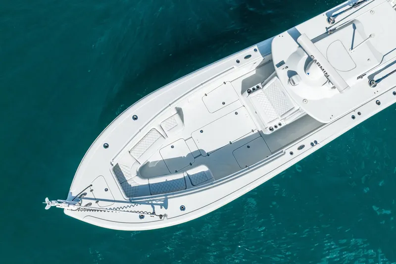 Slide: The Image of Aerial view of 2020 Yellowfin 36 Offshore boat on blue water. - 15