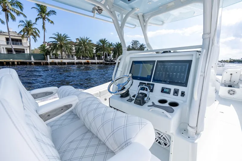 Slide: The Image of Interior view of a 2020 Yellowfin 36 Offshore boat with modern helm console. - 18