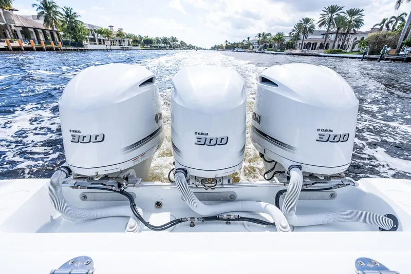 Slide: The Image of Three Yamaha 300 engines on a 2020 Yellowfin 36 Offshore boat. - 32
