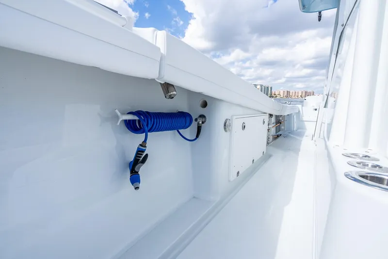 Slide: The Image of Interior view of 2020 Yellowfin 36 Offshore with blue hose holder. - 40