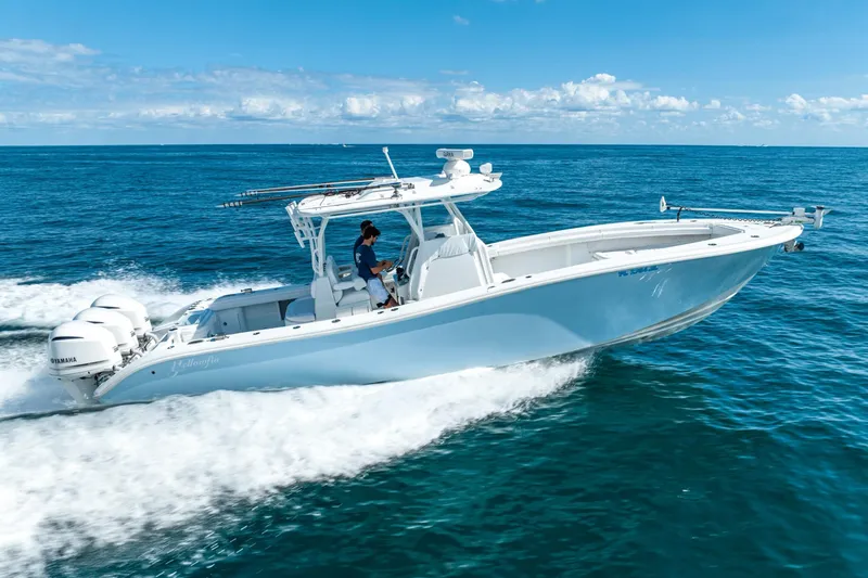 Slide: The Image of 2020 Yellowfin 36 Offshore boat cruising on open sea. - 6