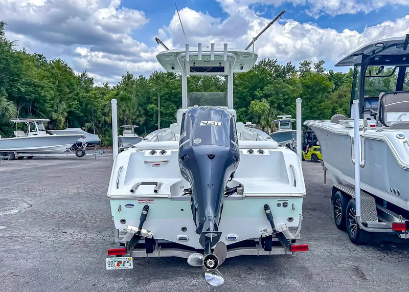 Slide: The Image of 2014 Sea Hunt Ultra 235 boat with outboard motor. - 5