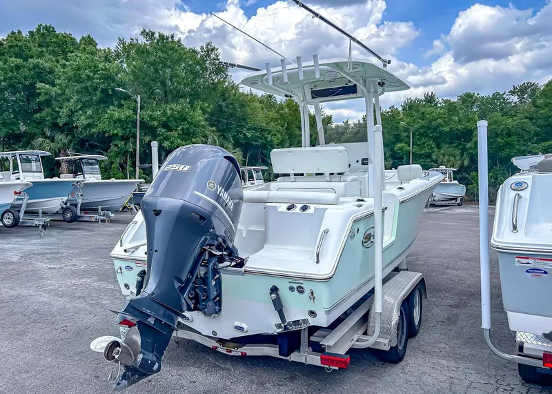 Slide: The Image of 2014 Sea Hunt Ultra 235 boat with Yamaha engine on trailer. - 6