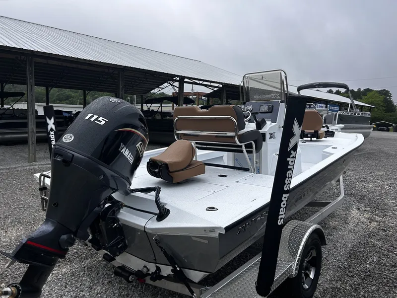 Slide: The Image of 2026 Xpress H20B Bay boat with Yamaha 115 engine on trailer. - 4