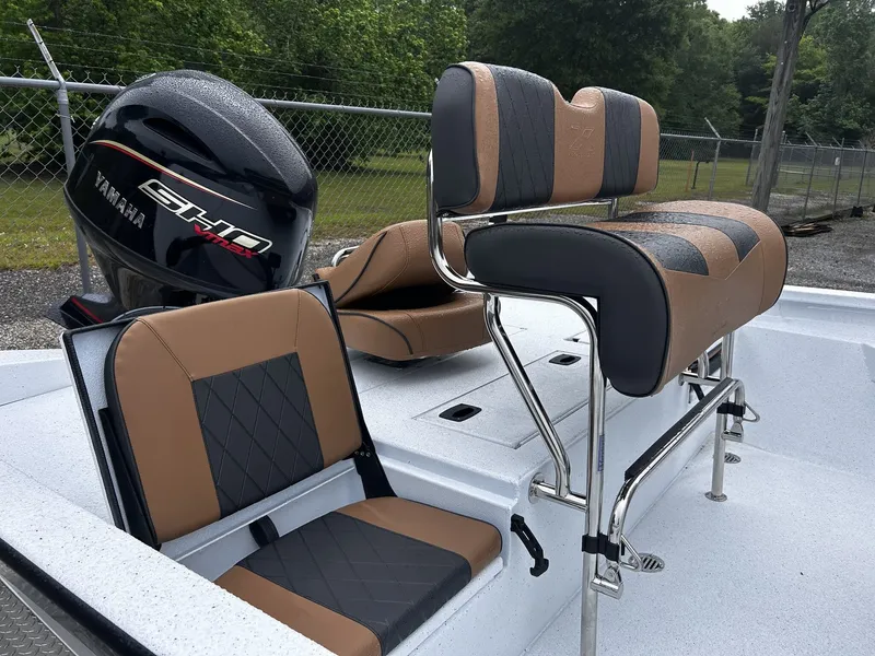 Slide: The Image of 2026 Xpress H20B Bay boat with Yamaha engine and cushioned seats. - 8