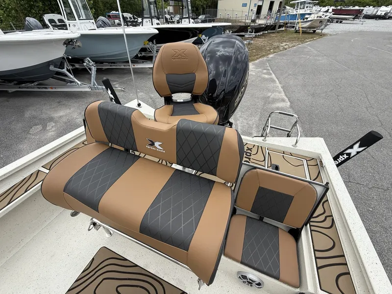 Slide: The Image of 2026 Xpress X23B Bay Lounge boat with luxurious seating. - 15