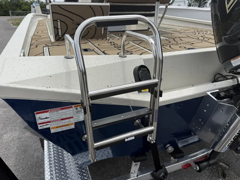 Slide: The Image of Xpress X23B Bay Lounge 2026 with stainless steel ladder at the stern. - 6