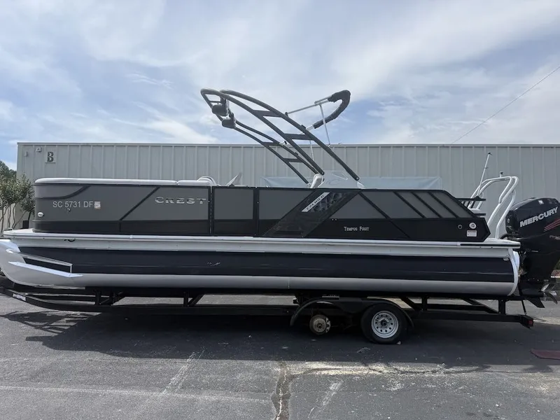 The Image of 2017 Crest Caliber 250 SLR2 pontoon boat on trailer. - 1