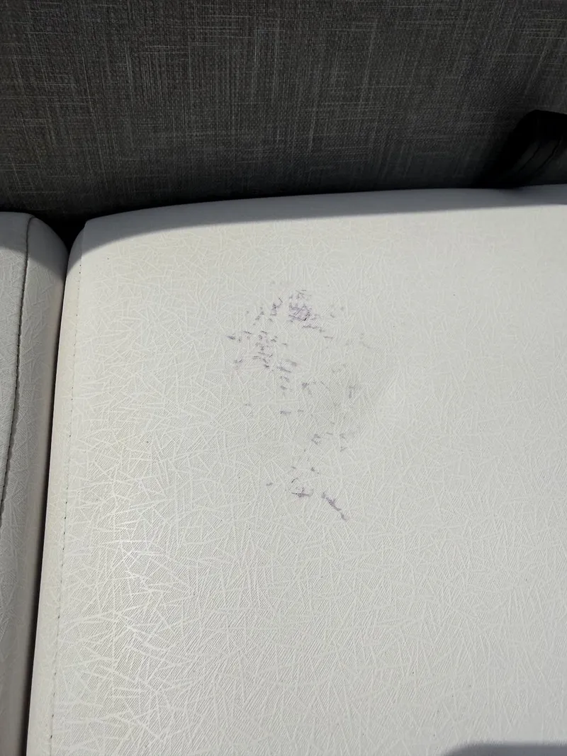 Slide: The Image of Damaged seat upholstery on a 2017 Crest Caliber 250 SLR2 boat. - 10
