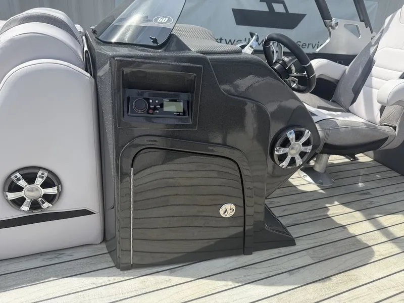 Slide: The Image of Interior of a 2017 Crest Caliber 250 SLR2 boat with control console. - 14