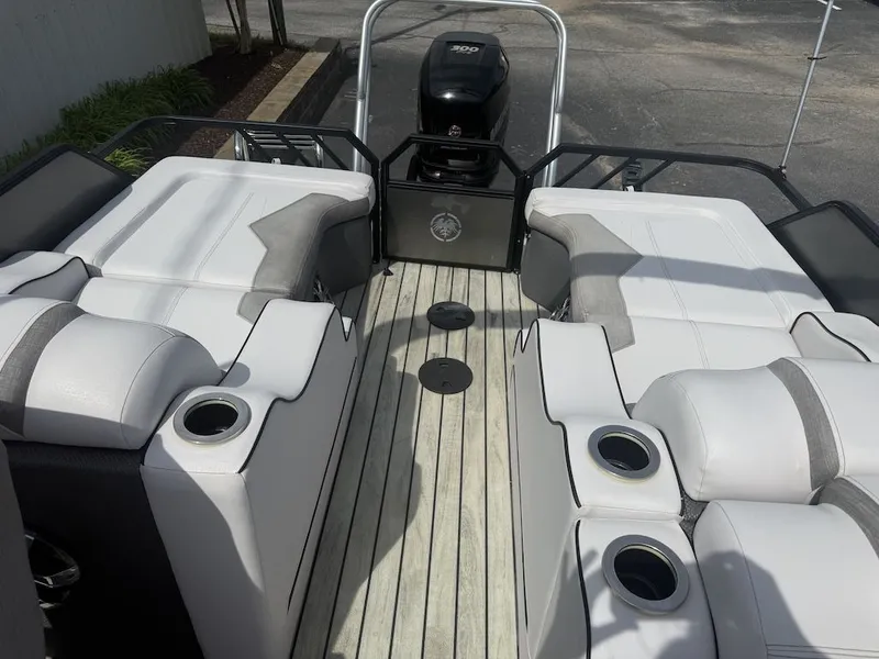 Slide: The Image of Interior of a 2017 Crest Caliber 250 SLR2 boat with white seating. - 15