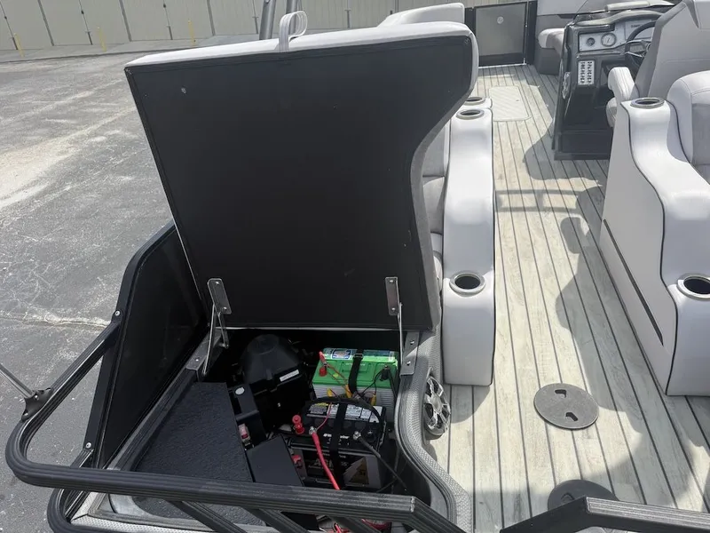 Slide: The Image of Interior view of a 2017 Crest Caliber 250 SLR2 boat with open battery compartment. - 19