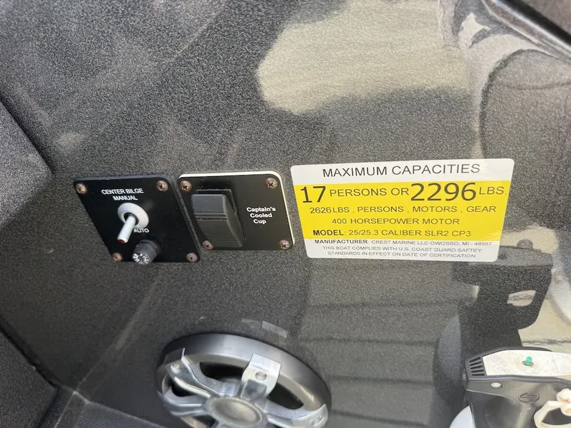 Slide: The Image of Crest Caliber 250 SLR2 2017 boat capacity label and controls. - 22