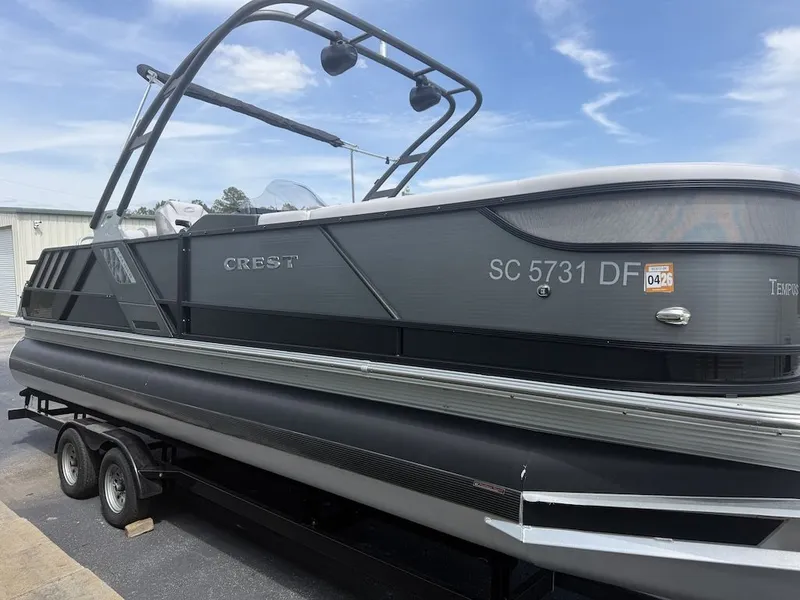 Slide: The Image of 2017 Crest Caliber 250 SLR2 pontoon boat on trailer. - 3