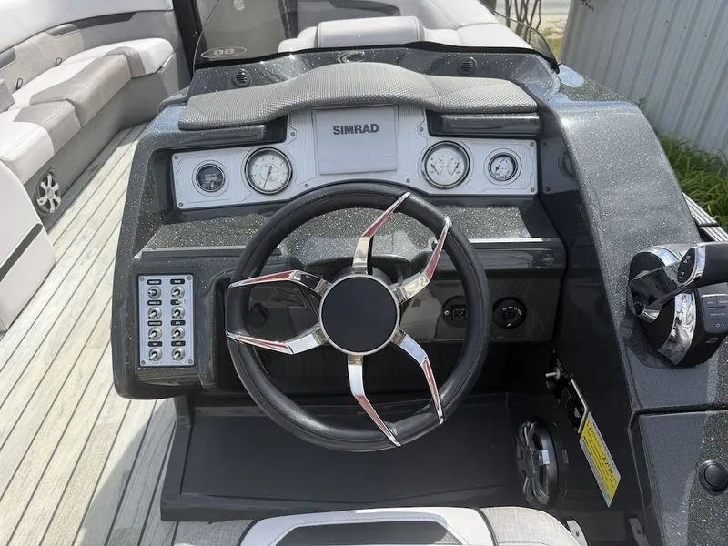 Slide: The Image of 2017 Crest Caliber 250 SLR2 boat helm with Simrad display. - 6