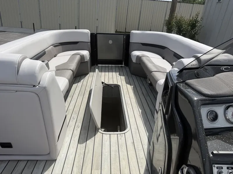 Slide: The Image of Interior of a 2017 Crest Caliber 250 SLR2 pontoon boat with luxurious seating. - 8