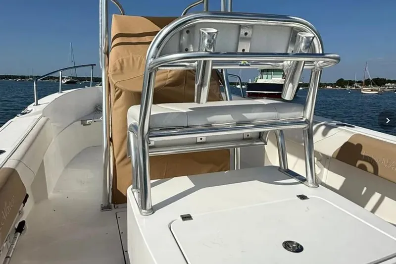 Slide: The Image of 2018 Edgewater 188CC boat interior with seating and ocean view. - 10