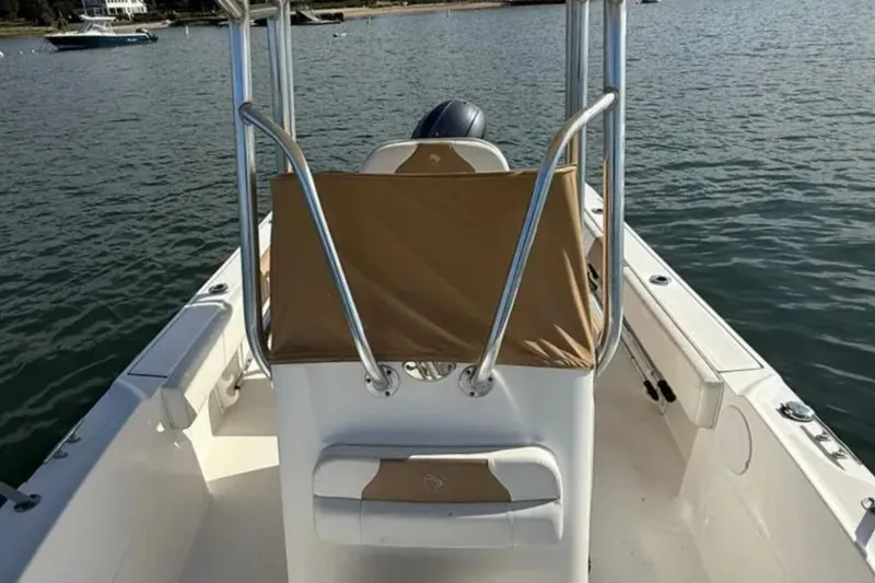 Slide: The Image of 2018 Edgewater 188CC boat on water, featuring center console and seating. - 12
