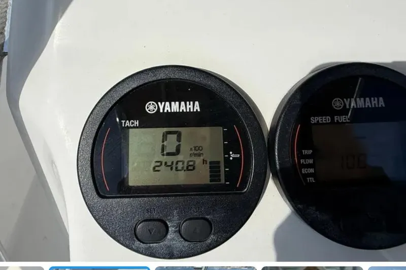Slide: The Image of Yamaha tachometer and speed fuel gauges on 2018 Edgewater 188CC boat dashboard. - 18