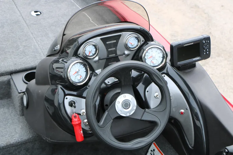 Slide: The Image of 2024 Tracker Pro Team 175 dashboard with steering wheel and gauges. - 16