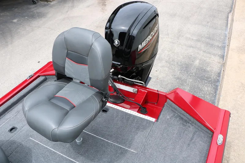 Slide: The Image of 2024 Tracker Pro Team 175 boat with Mercury engine and gray seating. - 28