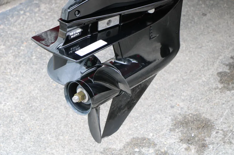 Slide: The Image of 2024 Tracker Pro Team 175 boat propeller on concrete surface. - 6