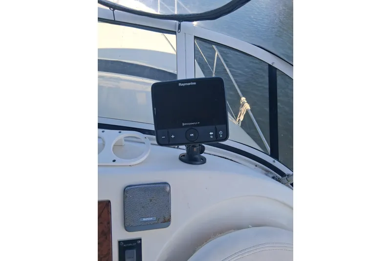 Slide: The Image of Raymarine navigation system on 2000 Sea Ray 420 Aft Cabin yacht dashboard. - 23