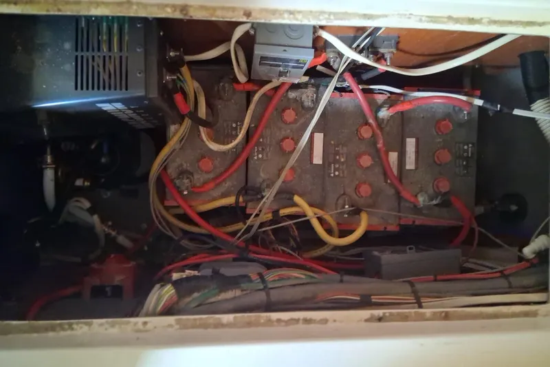 Slide: The Image of Electrical wiring and components inside a 2000 Sea Ray 420 Aft Cabin boat. - 31