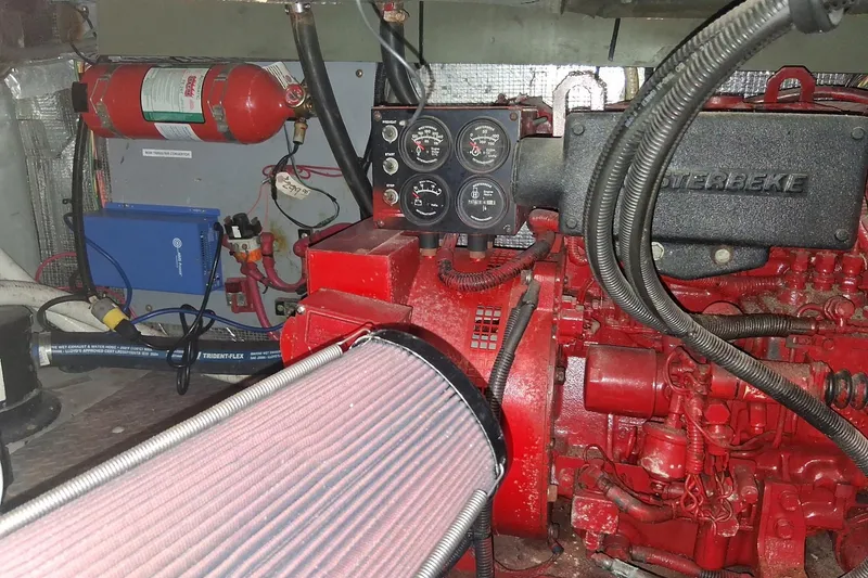 Slide: The Image of Engine room of a 2000 Sea Ray 420 Aft Cabin with Westerbeke generator. - 32