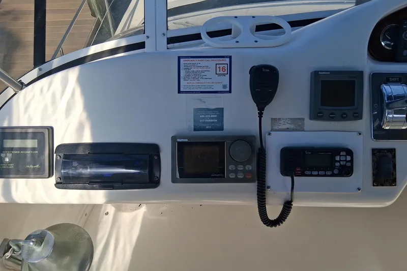 Slide: The Image of Control panel of a 2000 Sea Ray 420 Aft Cabin yacht with navigation equipment. - 22