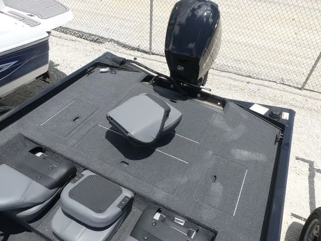 Slide: The Image of Lowe Stinger 175C 2026 boat with outboard motor and seating. - 14