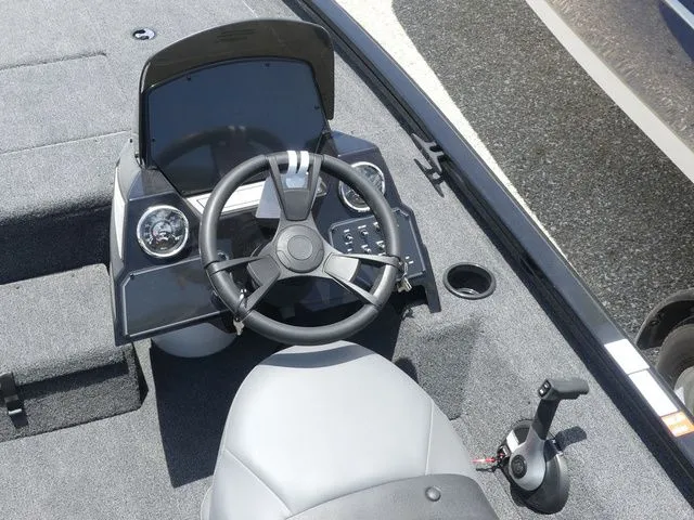 Slide: The Image of Interior of Lowe Stinger 175C boat, 2026 model, featuring steering console. - 15