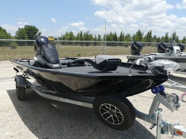 Slide: The Image of Black Lowe Stinger 175C boat, 2026 model, on trailer. - 3
