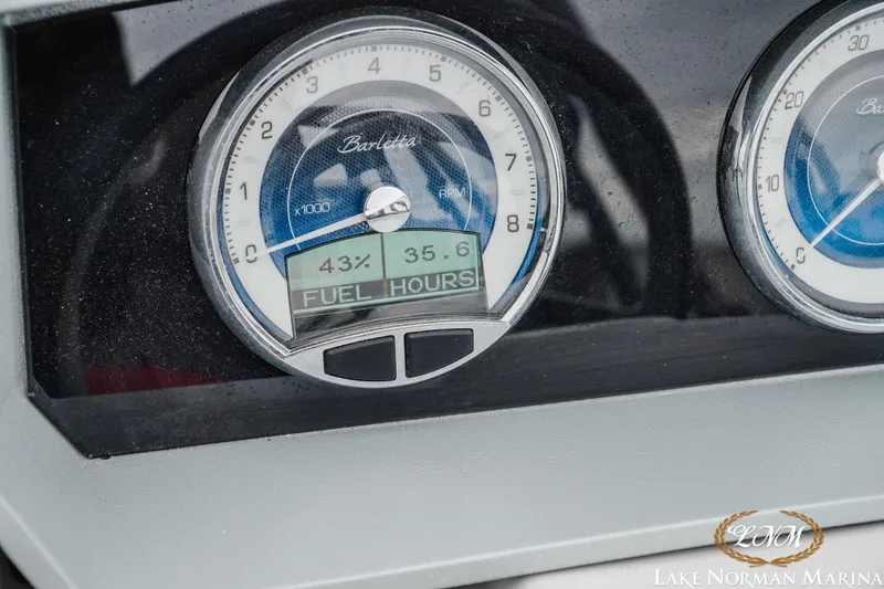 Slide: The Image of Dashboard of 2023 Barletta X23U showing RPM, fuel level, and hours. - 20