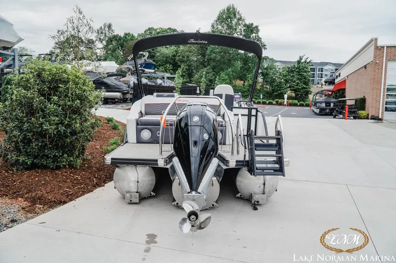 Slide: The Image of 2023 Barletta X23U pontoon boat at Lake Norman Marina, featuring sleek design and modern amenities. - 5