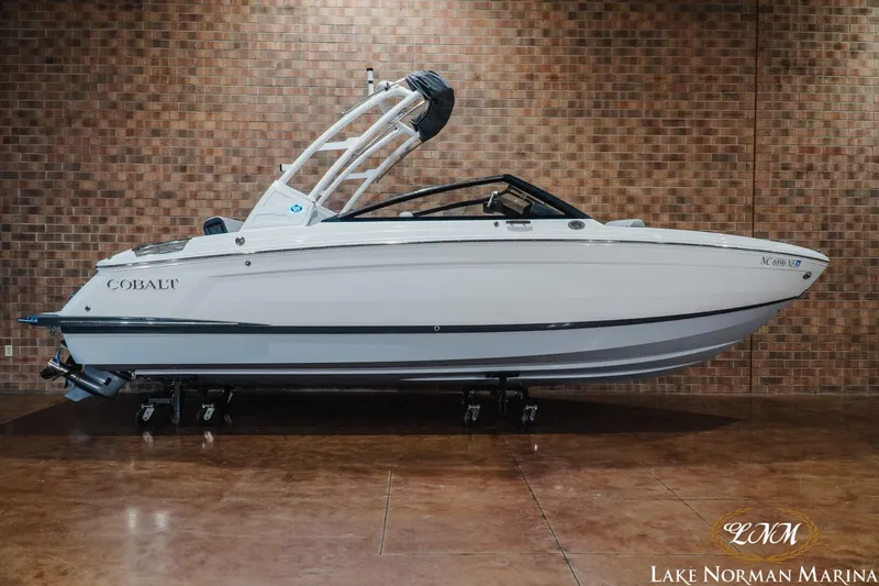 The Image of 2025 Cobalt R4 boat displayed indoors at Lake Norman Marina. - 1