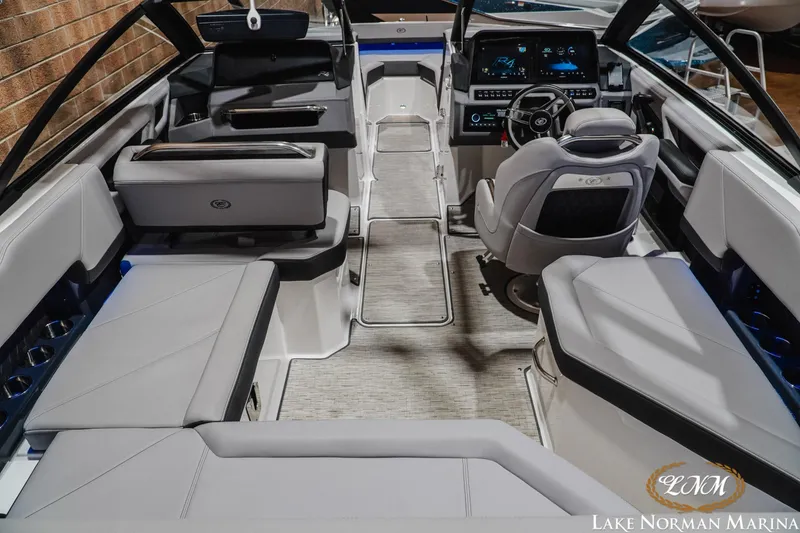 Slide: The Image of Luxurious interior of 2025 Cobalt R4 boat with modern seating and advanced dashboard. - 10
