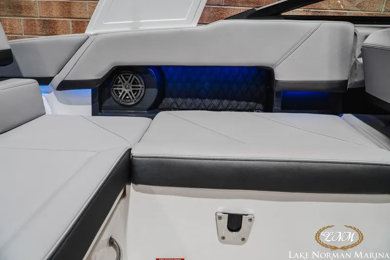 Slide: The Image of Interior of 2025 Cobalt R4 boat with sleek seating and integrated speaker system. - 22