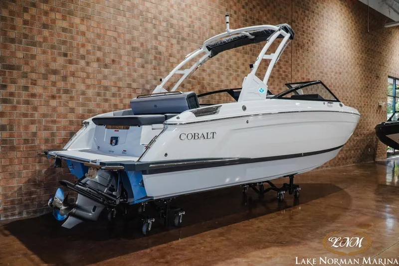 Slide: The Image of 2025 Cobalt R4 boat displayed indoors at Lake Norman Marina. - 3