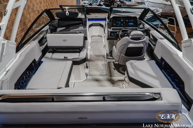 Slide: The Image of Interior of 2025 Cobalt R4 boat with modern seating and advanced dashboard at Lake Norman Marina. - 8