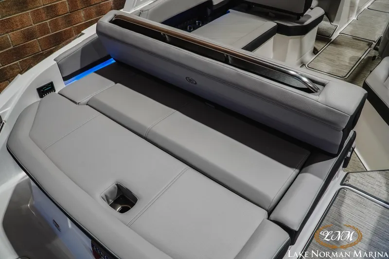 Slide: The Image of 2025 Cobalt R4 boat interior with sleek gray seating and modern design. - 9