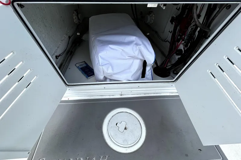 Slide: The Image of Open compartment of 2025 Savannah 210X with covered equipment inside. - 27