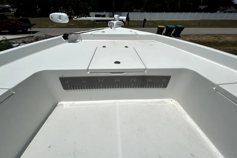 Slide: The Image of Interior view of a 2025 Savannah 210X boat with a built-in measuring scale. - 32