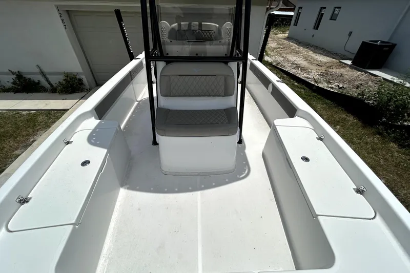 Slide: The Image of 2025 Savannah 210X boat interior with seating and storage compartments. - 39
