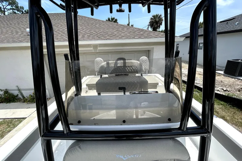 Slide: The Image of 2025 Savannah 210X boat interior with sleek seating and modern design. - 46