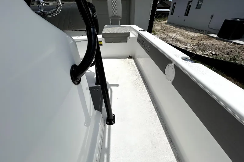 Slide: The Image of 2025 Savannah 210X boat interior, featuring sleek design and sturdy railing. - 50