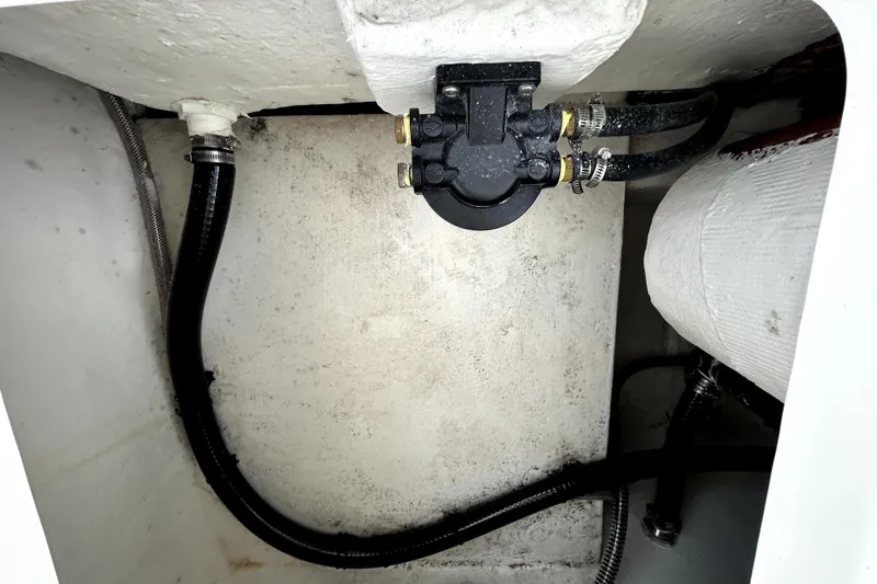 Slide: The Image of Bilge area of 2025 Savannah 210X boat with hoses and pump system. - 55