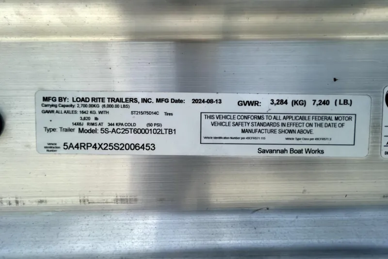 Slide: The Image of Trailer label with specifications, including GWR, carrying capacity, and manufacturing details, Savannah 210X 2025. - 60
