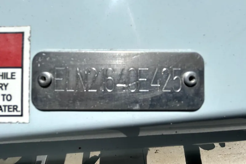 Slide: The Image of Metal identification plate on a 2025 Savannah 210X vehicle. - 65